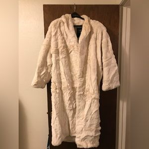 Full length white mink coat.